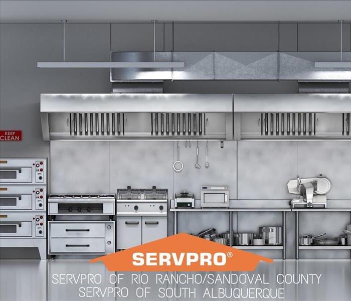 SERVPRO logo over a clean and sanitized commercial kitchen  